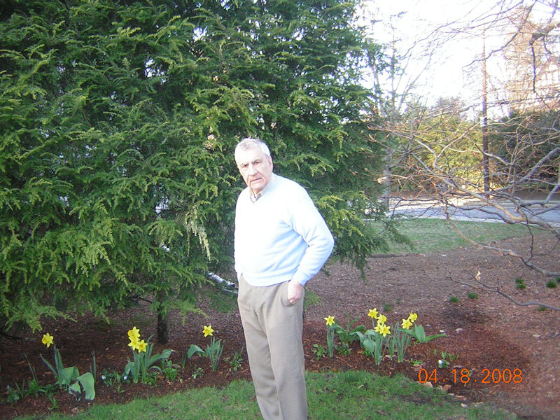 Standing next to the pansy violets he had just planted, April 2008.